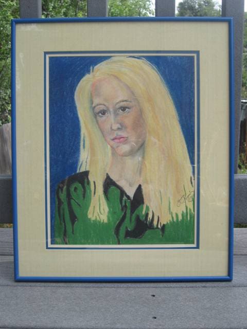 A painting of a woman with blonde hair.