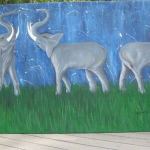 A painting of three animals grazing in the grass.