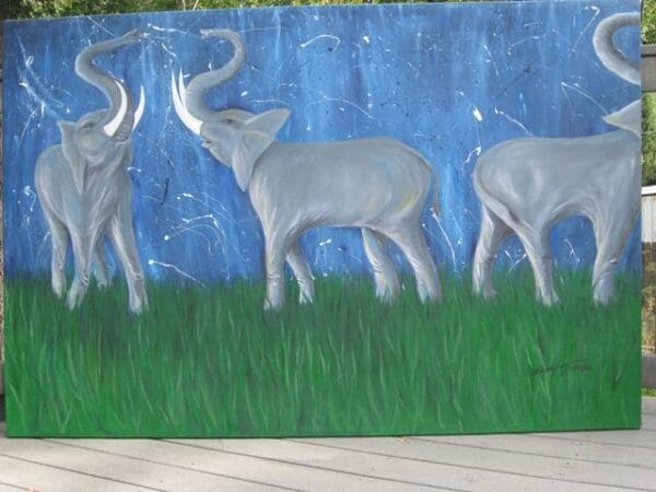 A painting of three animals grazing in the grass.